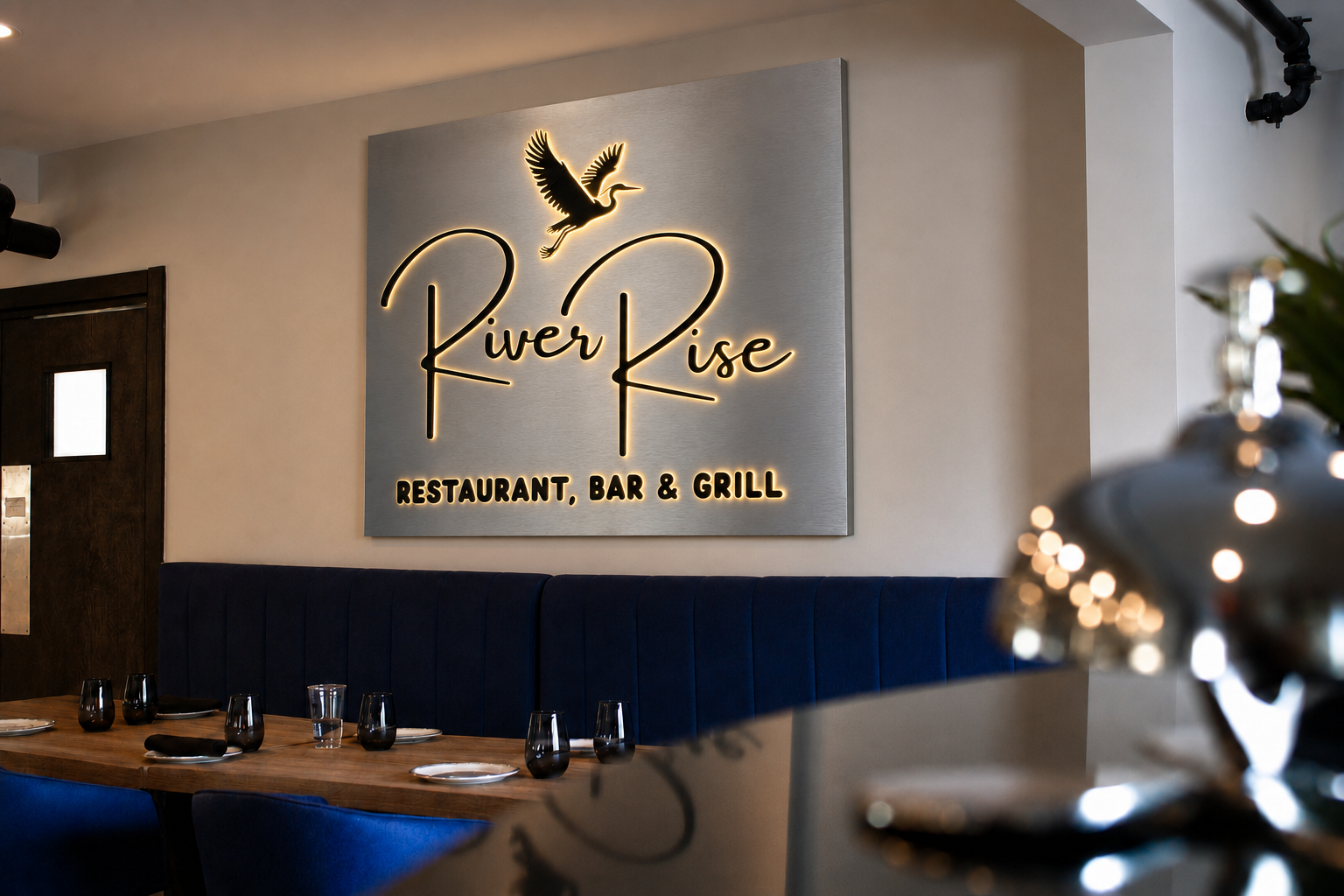 RiverRise Restaurant interior logo sign